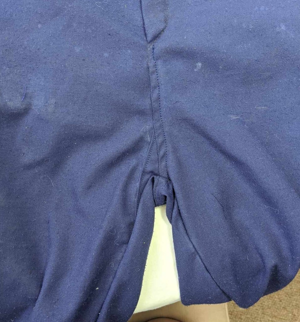 Frayed seam fixed with small patch on overalls | Bobbins for Dobbins